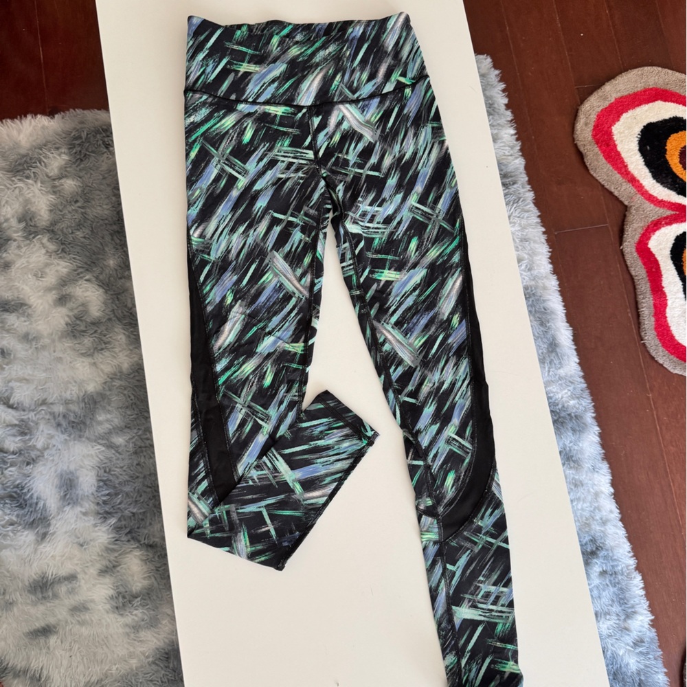 VSX Black and Green Leggings with Dynamic Design